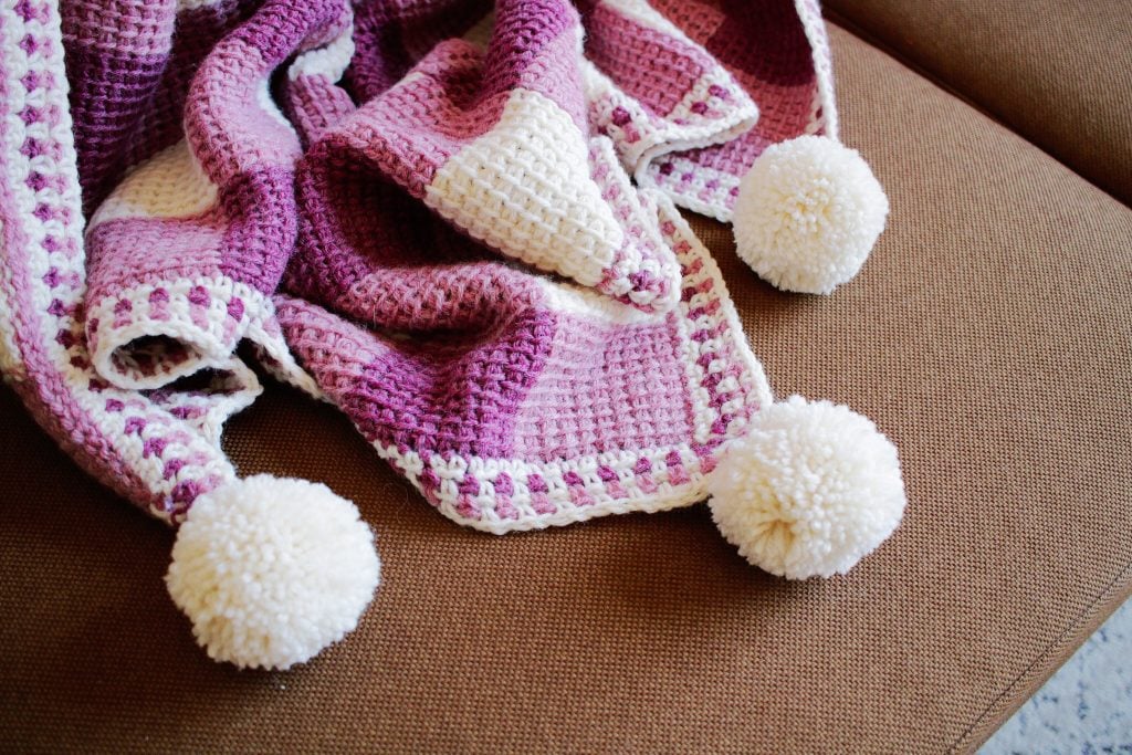 sweet gingham baby blanket tl yarn crafts tunisian crochet lion brand wool ease pom pom linen stitch moss stitch plaid pink purple baby girl blanket
