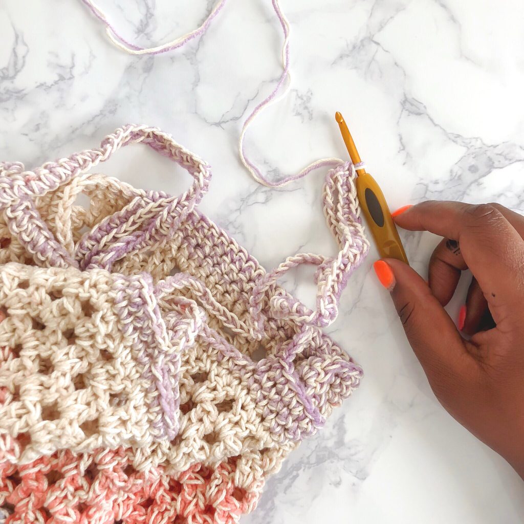 Make the Fresh Market Tote, a fun and FREE crochet market bag pattern from TL Yarn Crafts. Combine cotton and acrylic yarn for a sturdy and beautiful bag. Includes full FREE pattern and video tutorial. Perfect for Mother's Day, teacher gifts, and housewarming gifts. 
