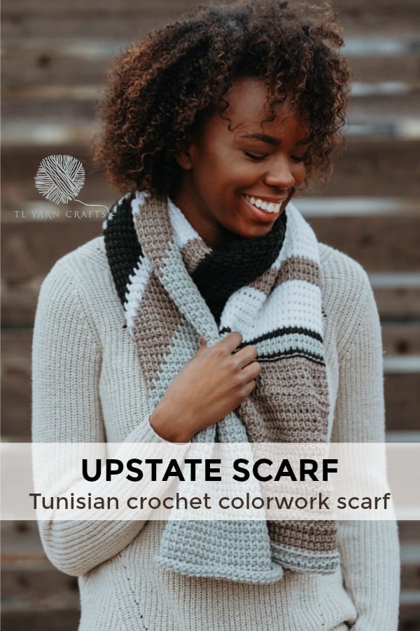 Make the new Upstate Scarf from TL Yarn Crats, a Tunisian crochet pattern that includes colorwork, bold stripes, and textured stitches. Pattern includes a helpful chart and links to Tunisian crochet instructional videos. Sample made with Spud & Chloe Yarn; project sponsored by LoveCrochet and Blue Sky Fibers. | TLYCBlog