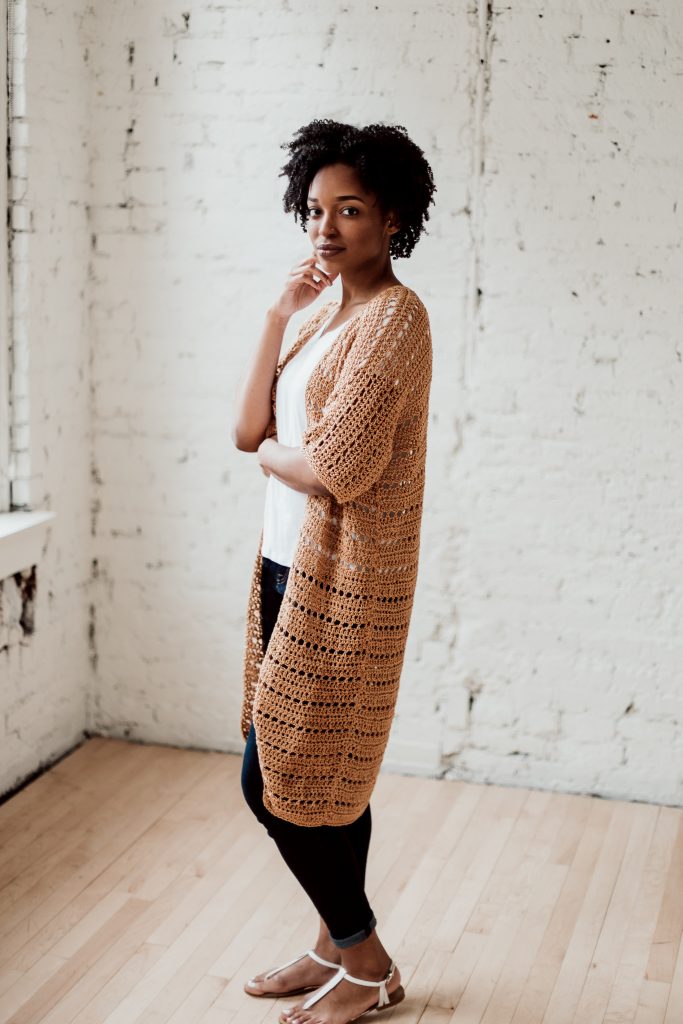 Transport yourself to the island vacation of your dreams when you slip on the Sandbar Cardi, a cotton crochet cardigan pattern from TL Yarn Crafts. Easy stitches and a simple pattern repeat make for a fun, meditative crochet experience. Buy the individual pattern or pick up the all-in-one kit from Lion Brand. | TLYCBlog.com