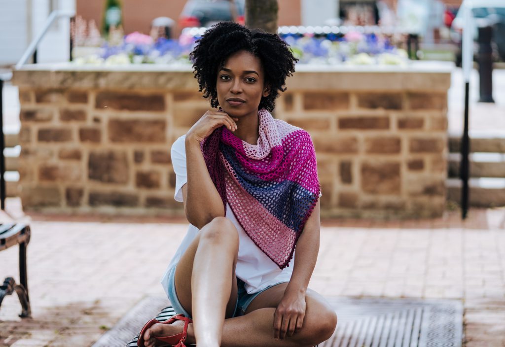 Feel the summer breeze with the easy & fun Carillon Shawl, a FREE pattern with tutorial video, now availalbe on TLYCBlog.com. This lovely crochet wrap is starts with just a few stitches and grows with each row. The result is a colorful crochet shawl that's perfect in any season.| TLYCBlog.com #crochet #shawl #freecrochetpattern #summer #beginner
