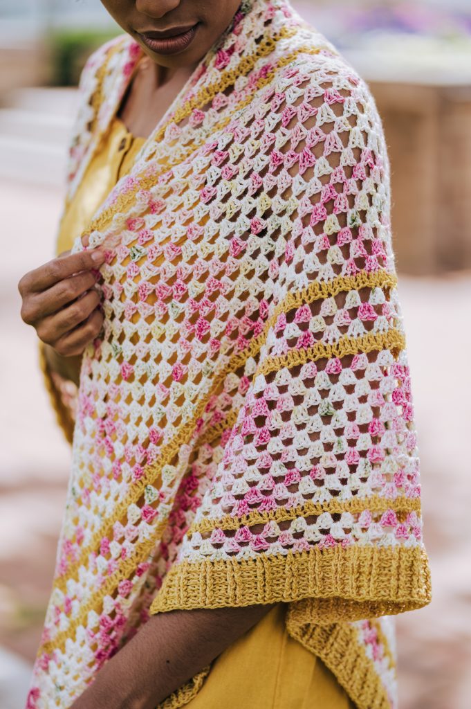 Make the Garden Party Shawl, a floral-inspired crochet triangle scarf. Crochet pattern available now! | TLYCBlog.com