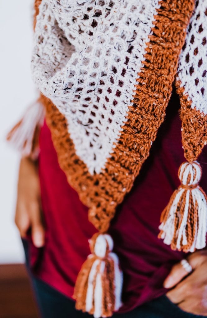 Hayride Triangle Scarf | Crochet triangle scarf pattern, beginner friendly, dk weight, easy crochet shawl pattern, ribbed border, chunky tassels. | TLYCBlog.com