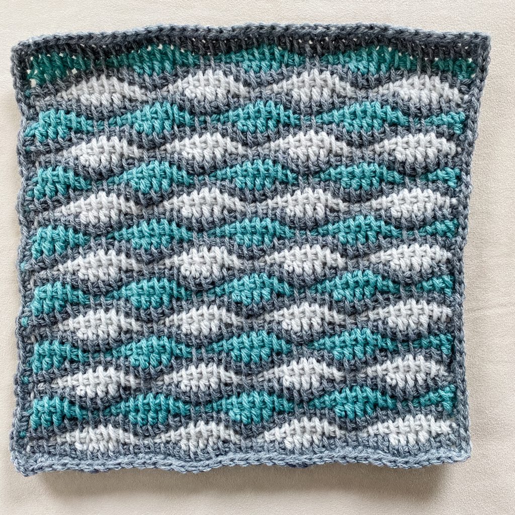 Tunisian crochet wave stitch | Free written pattern and tutorial video for Tunisian crochet beginner learn how to crochet the Tunisian crochet wave stitch | TLYCBlog.com