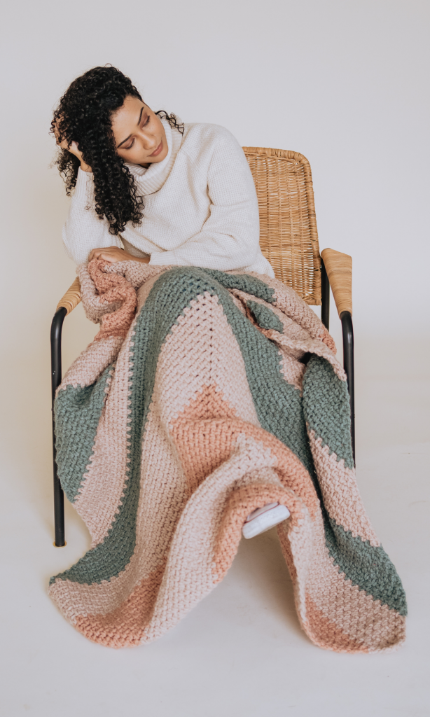 Crochet the Bradley Afghan, a free crochet pattern for a chunky modern geometric throw blanket. Includes free pattern and tutorial video. | TLYCBlog.com