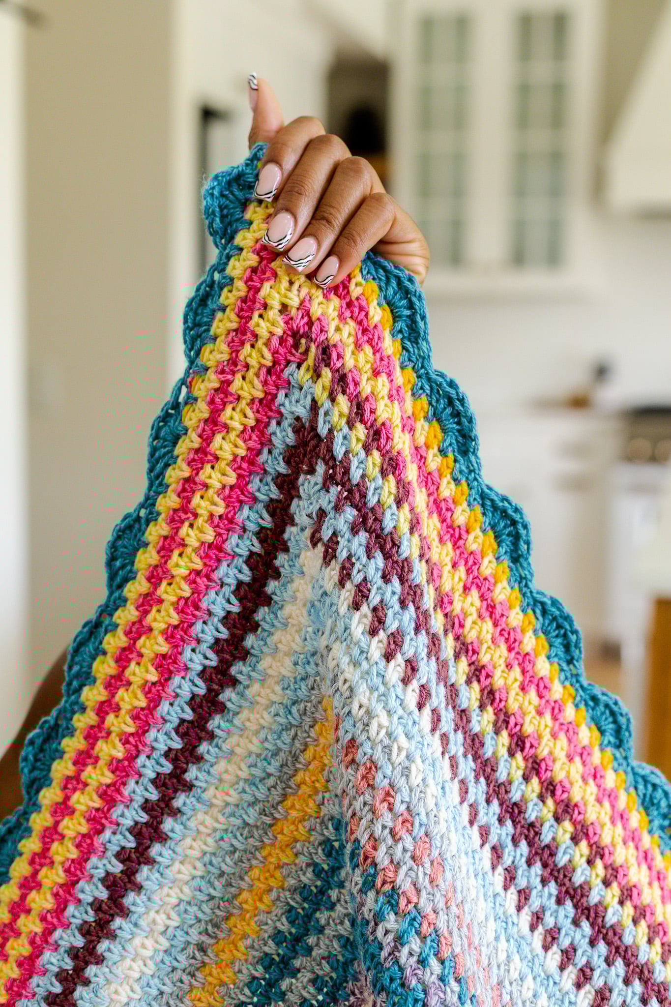 Niko Throw Blanket, a beginner-friendly linen stitch rectangle blanket - free pattern. Great for stash busting!