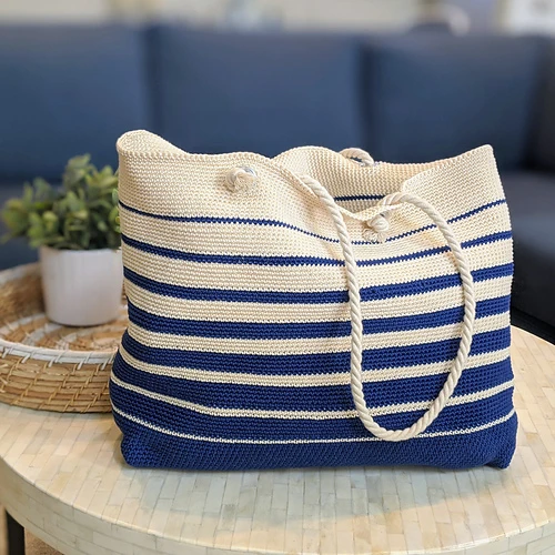 Navy and natural striped crochet beach tote with rope handles and metal grommets, Marina Tote Bag by Knit Paint Sew