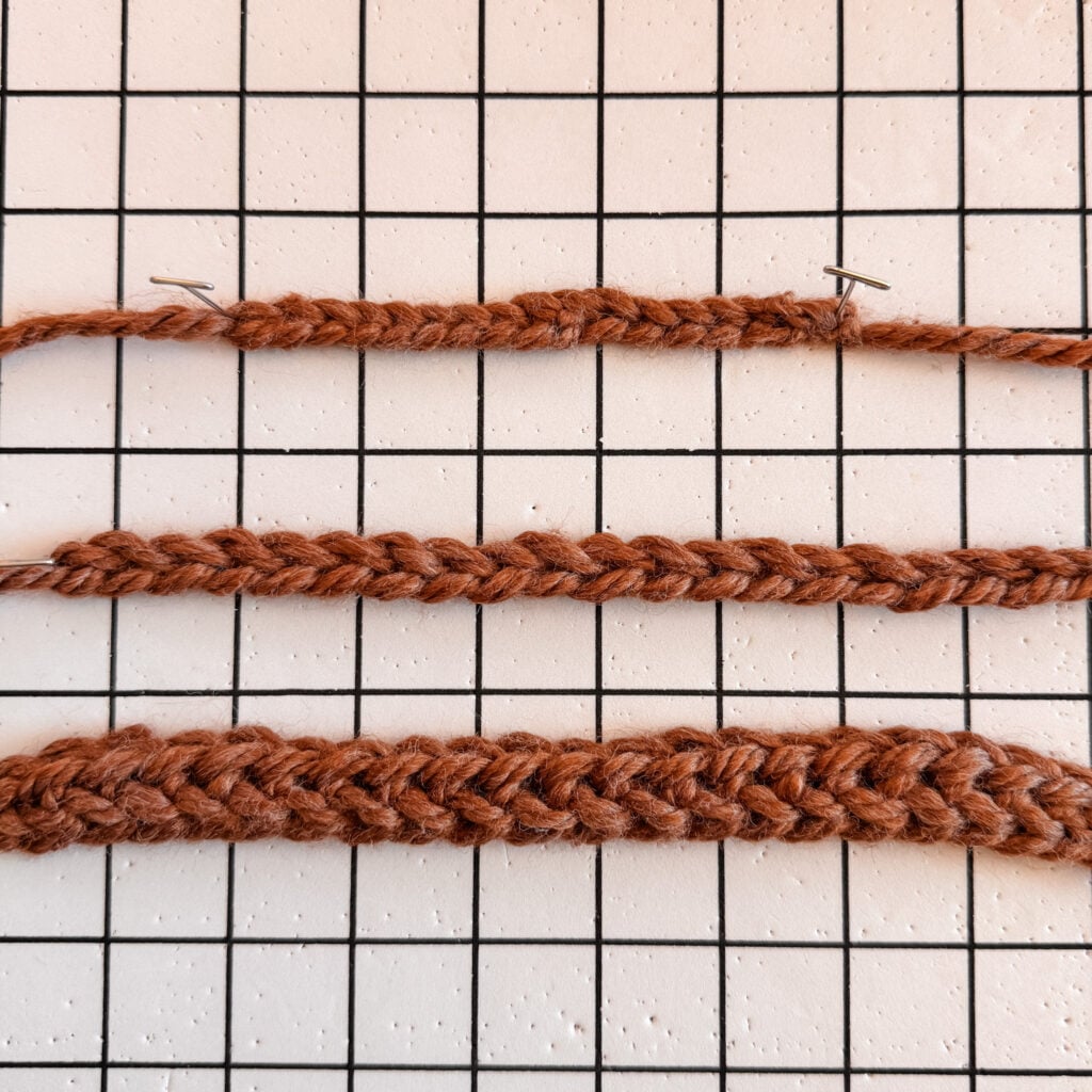 Three crochet starting chains made with tight, balanced and loose tension arranged on a grid for comparison.